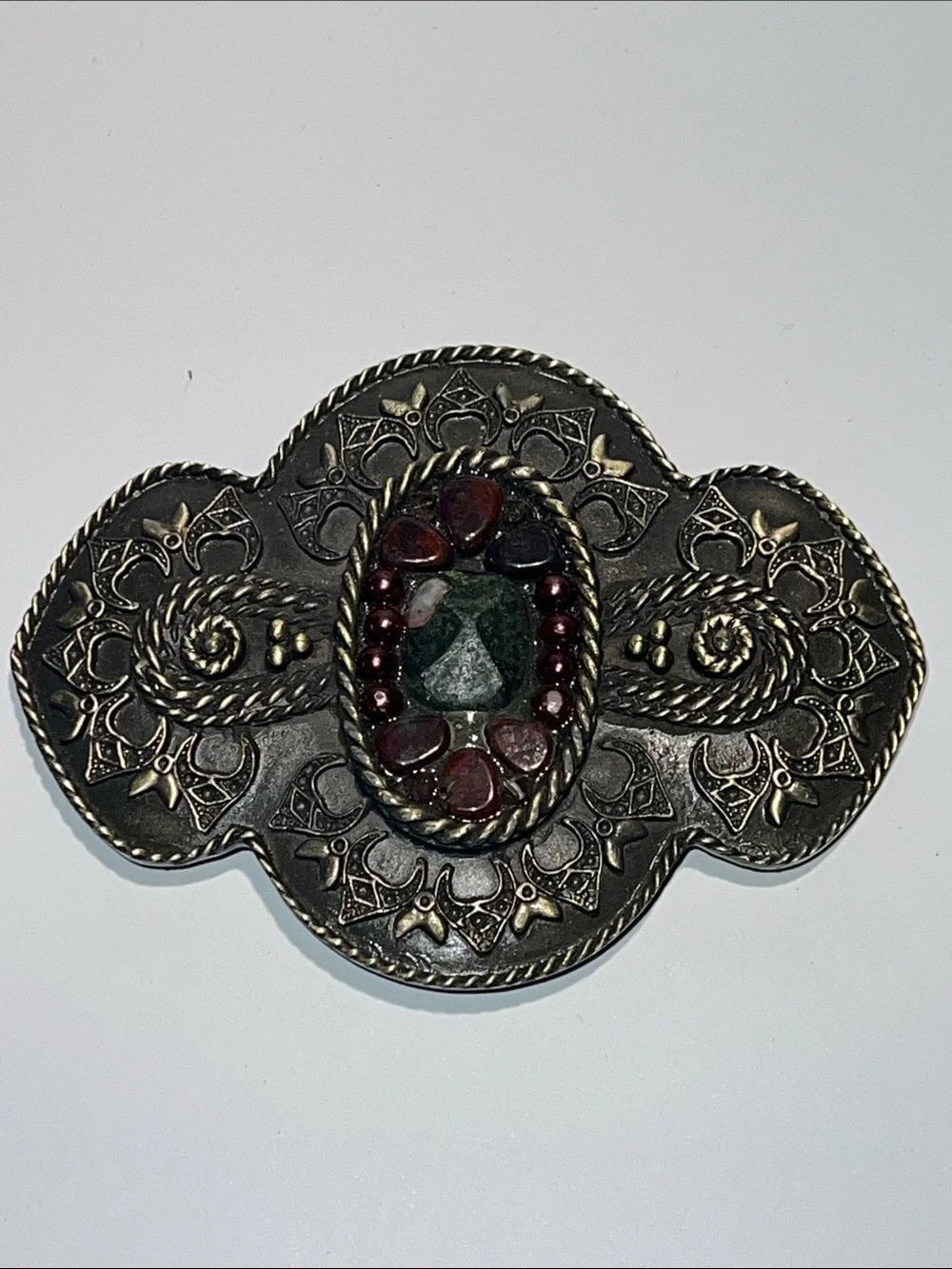 Ornate Metal Belt Buckle with Green Center and Burgundy Accents Stones